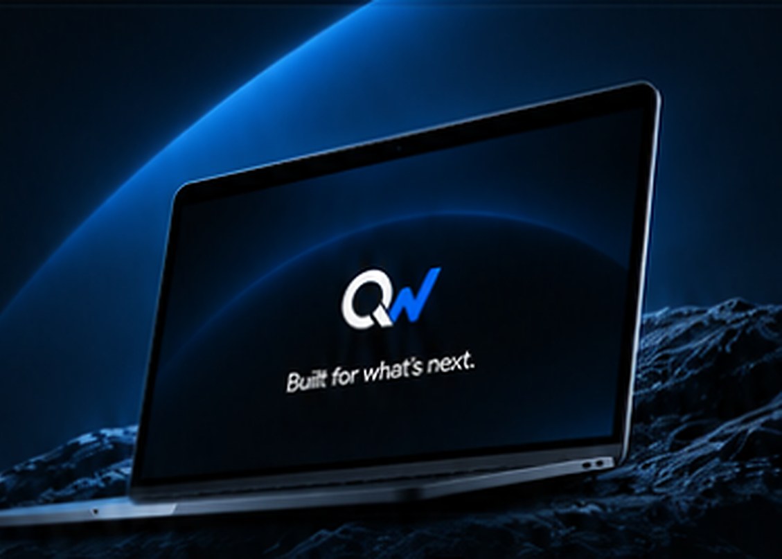 QuantWeb laptop showing the QW mark